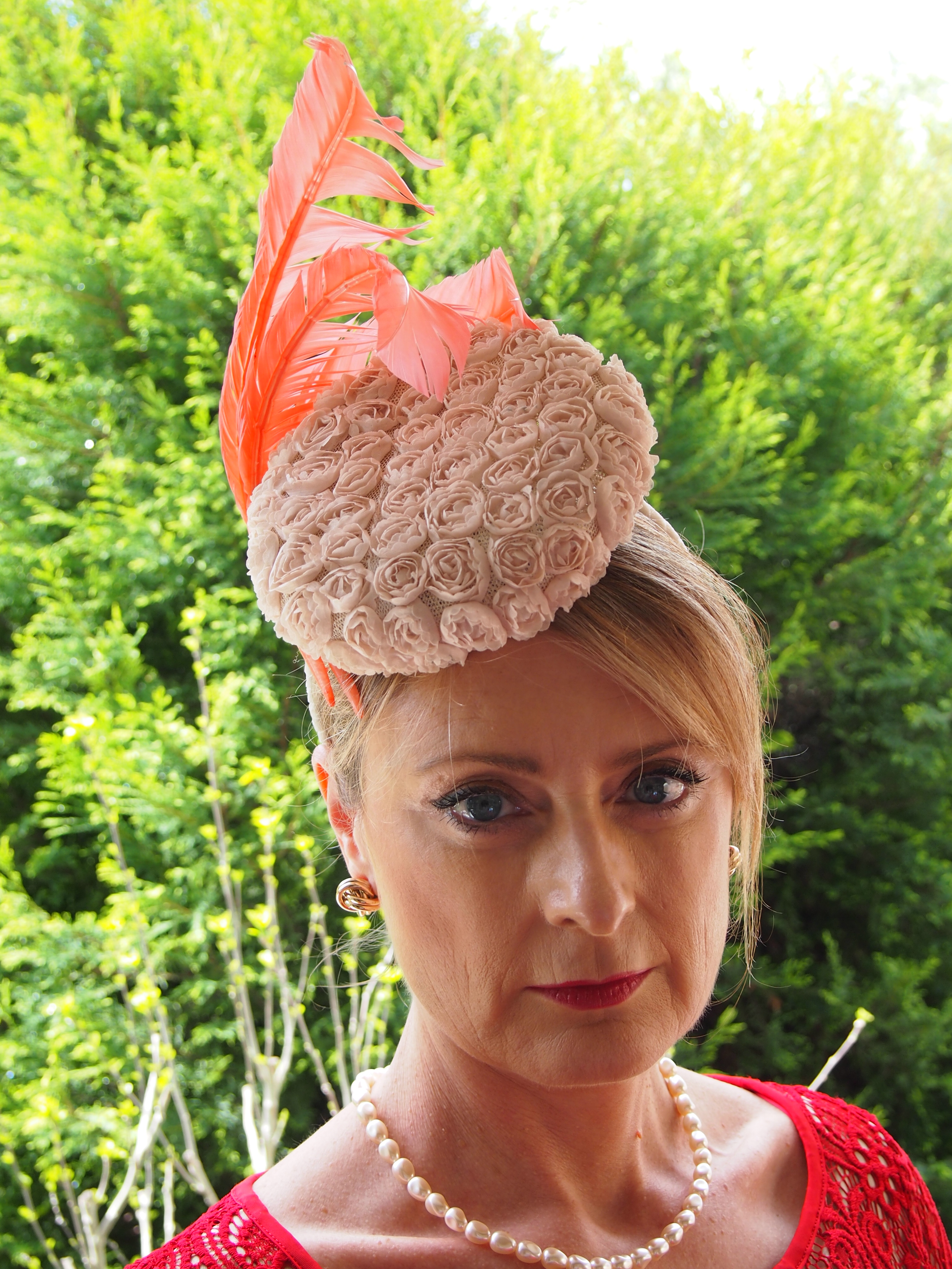 Minature Rose Button Hat with coral feathers $330